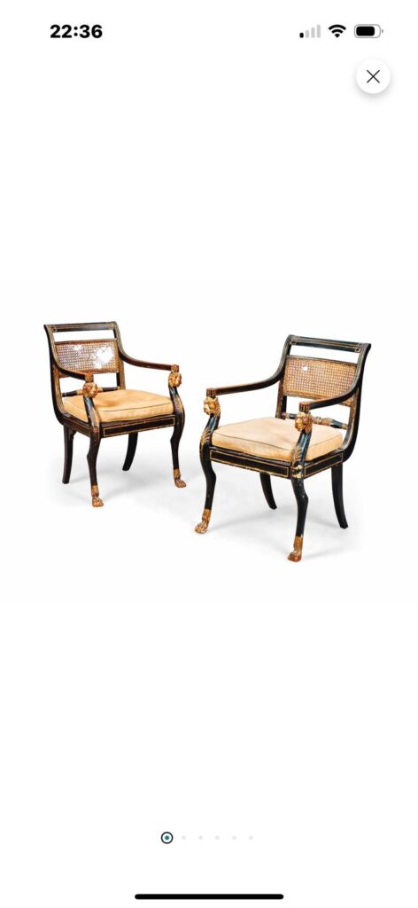 A pair of Regency bronze-painted and parcel gilt armchairs, attributed to Gillows, circa 1806-1807.