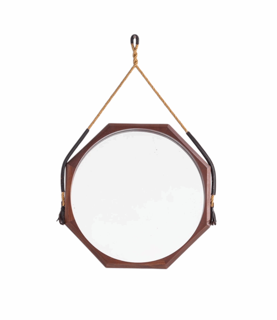 An octagonal hardwood mirror by Dino Cavalli, circa 1960.