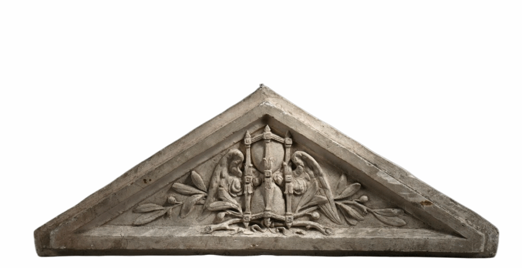 A plaster pediment with allegorical decoration of a winged clepsydra.