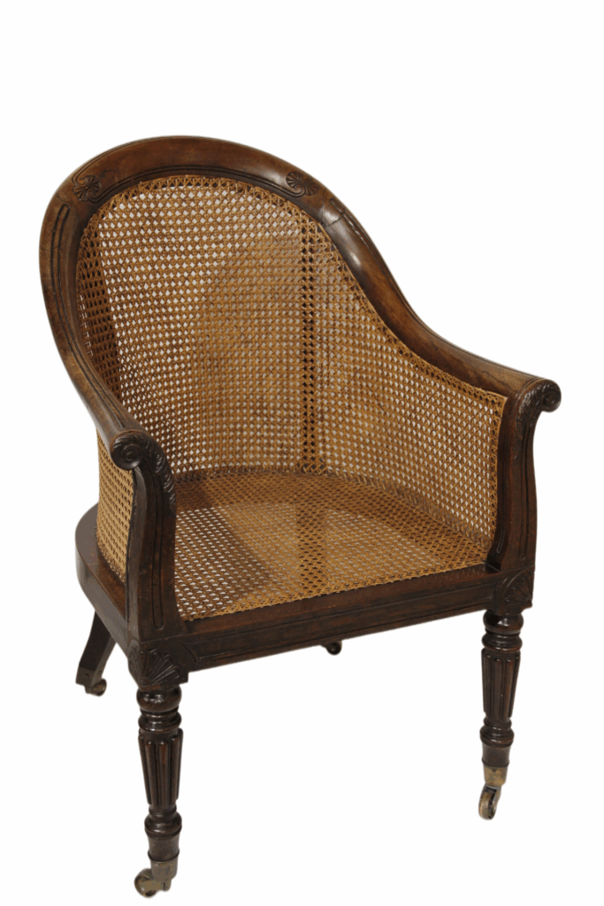 A Regency rosewood bergere by Gillows.