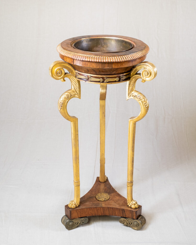 A Regency gilt-brass mounted rosewood and parcel-gilt jardiniere.