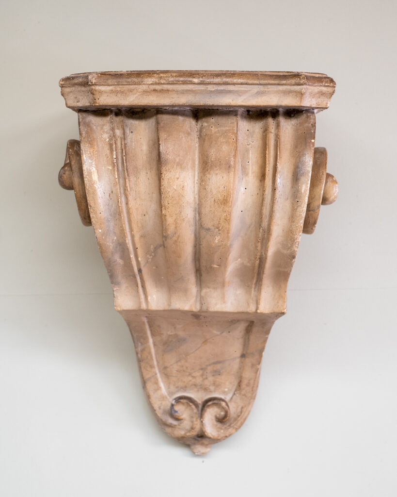 A pair of Italian 19th century faux marble wall brackets.