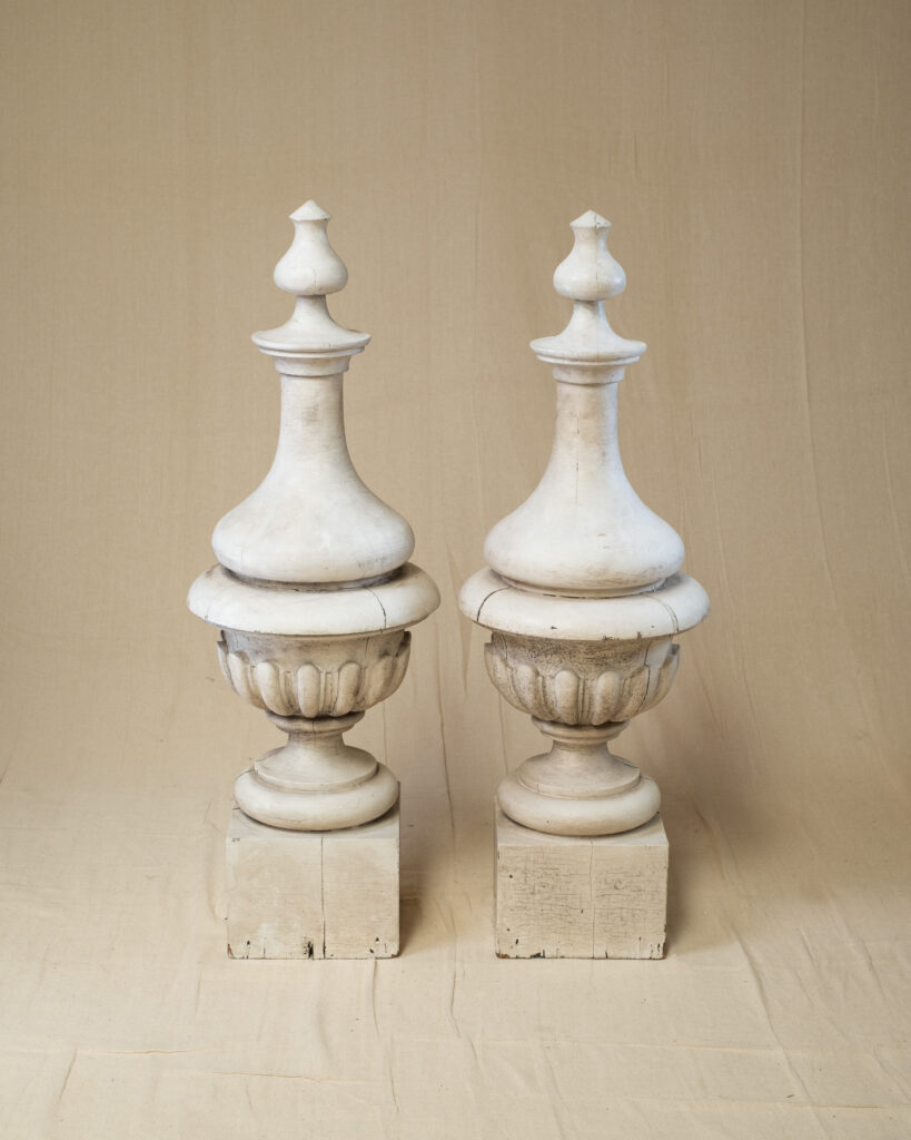 A pair of painted wood finials, 19th century.