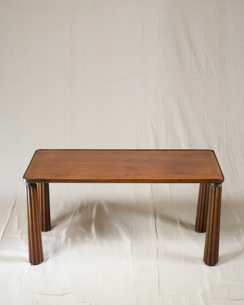 An hardwood coffee table by Paolo Buffa.