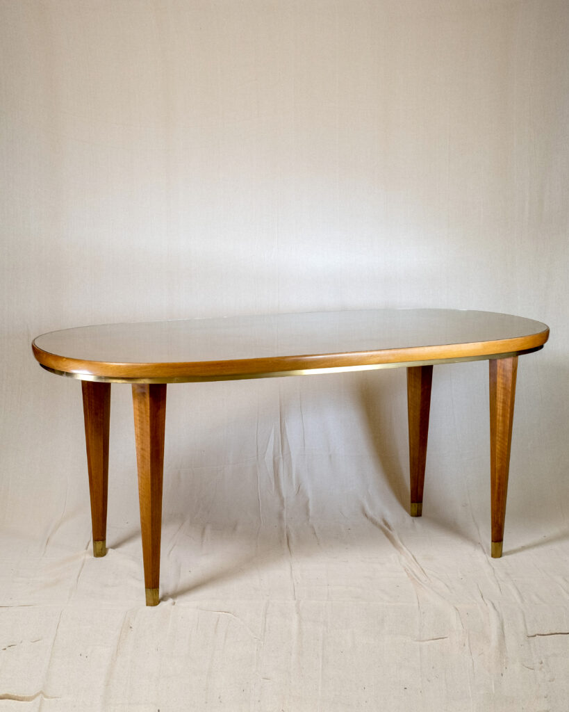A walnut, brass and glass console/table, mid-century by Melchiorre Bega.